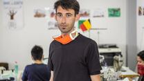 Ammar standing in a workshop making masks during the pandemic