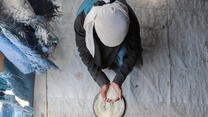 A girl holding rice