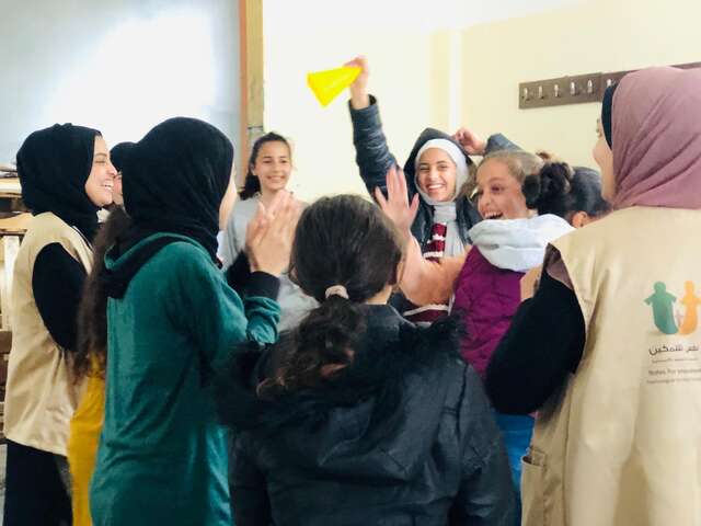 Children play during a session run by the IRC and Nafs.