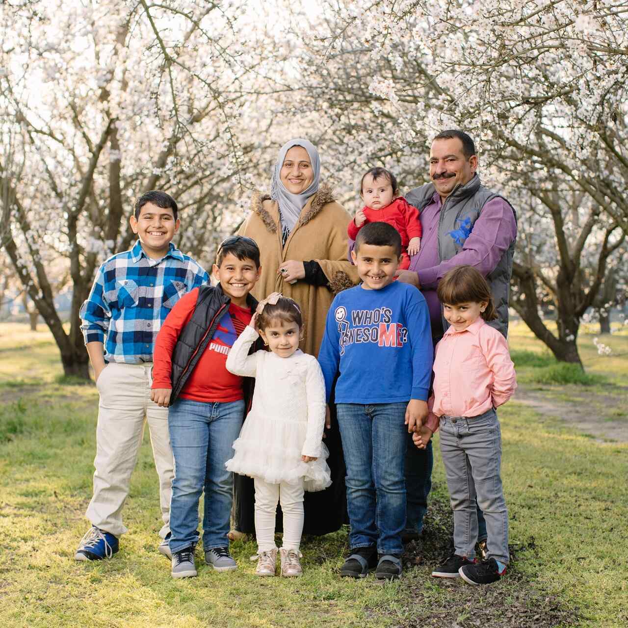 A family posing for a family portrait.