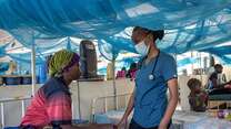 A IRC malnutrition officer consults a patient at a health center in Kenya.